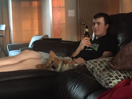 Relaxing with his dog and a ROOT beer
